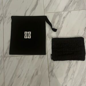 Two Givenchy cosmetic bags